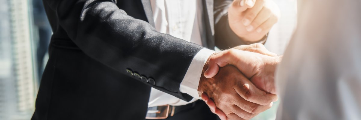 business background of businessman having handshake business background of businessman having handshake